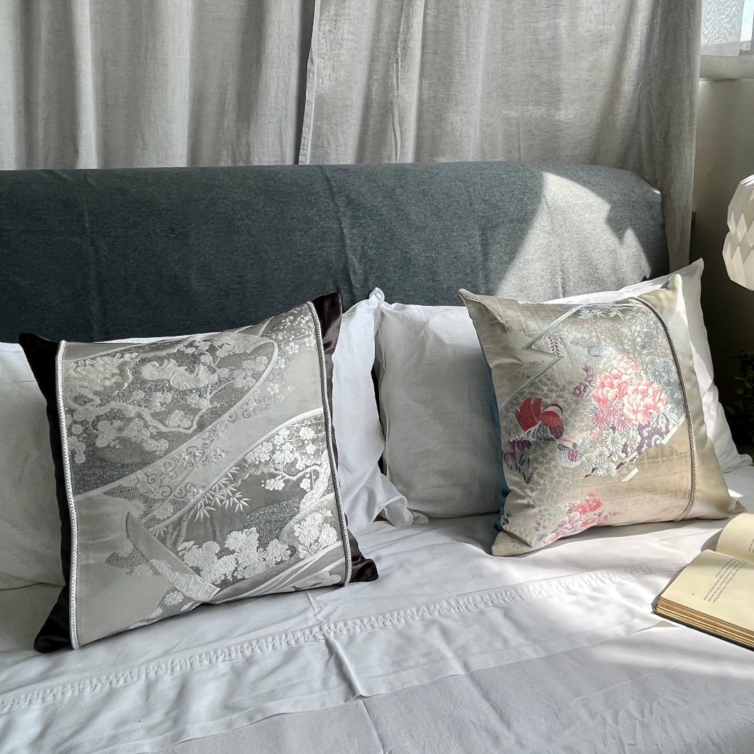 Handcrafted obi silk cushions with mandarin ducks. His and hers. Pink and blue on ivory silk.