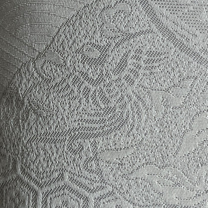 detailed close up of silver on white motif of good luck flying phoenix cushion