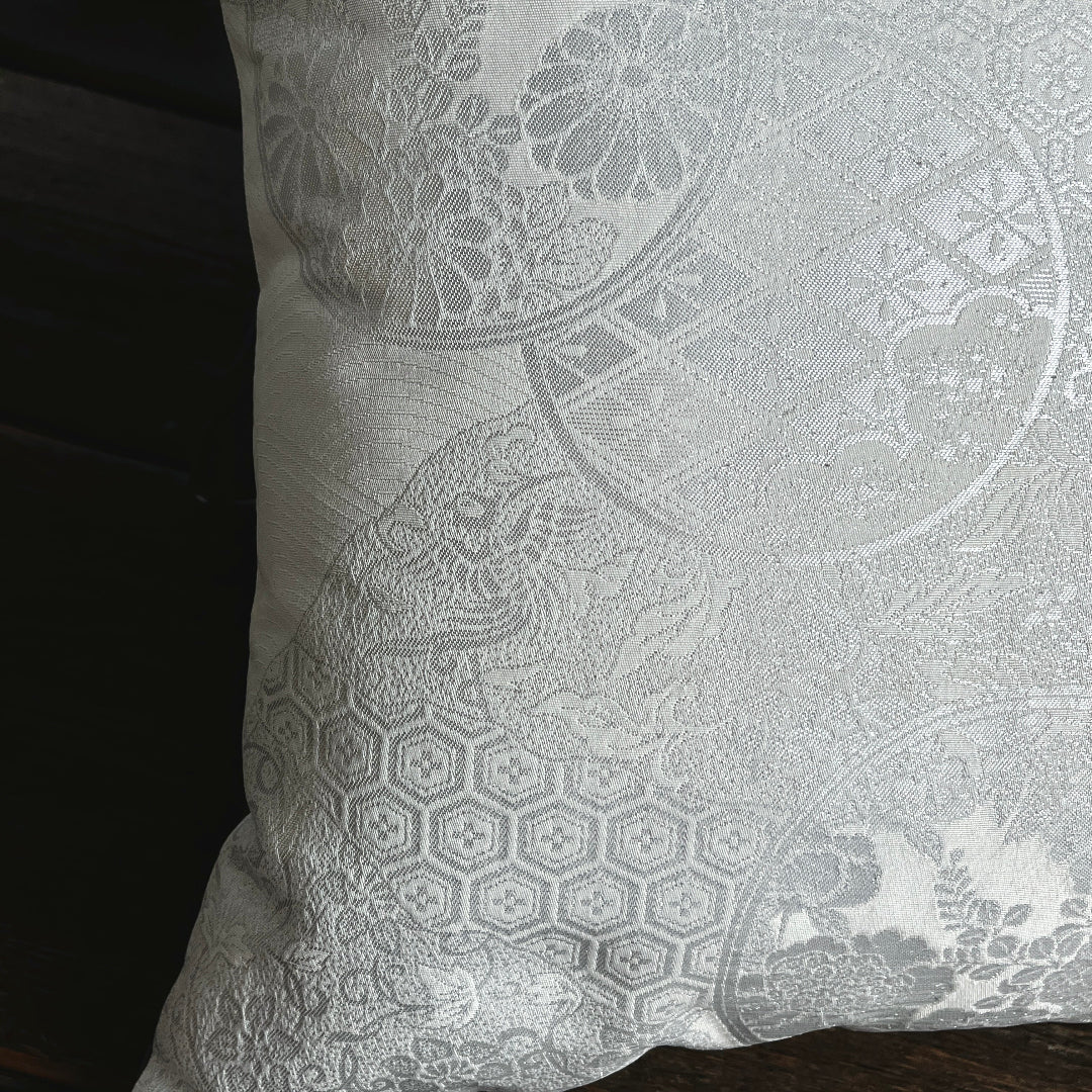 Japanese wedding silk Obi luxury cushion depicting a flying phoenix alongside other symbols of good fortune.