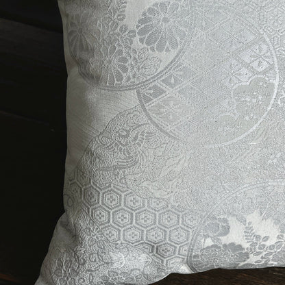 Japanese wedding silk Obi luxury cushion depicting a flying phoenix alongside other symbols of good fortune.